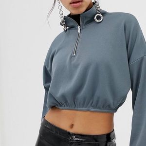 Cropped zip up sweater from Pretty Little Thing